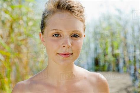 Nude Woman Standing In Riverbank Stock Photo Dissolve