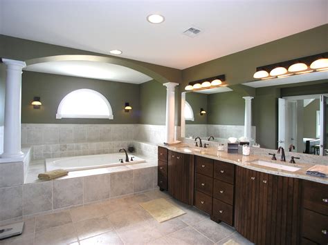 For a large bathroom vanity light fixtures, opt for one or two wall scones placed in a position where they properly illuminate the mirror. The Different Styles of Bathroom Lighting