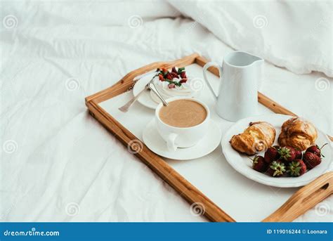 Cozy Home Breakfast In Bed In White Bedroom Interior Stock Photo