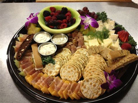 Smoked Salmon Platter With Fresh Fruit Cheese And Crackers By Kellys