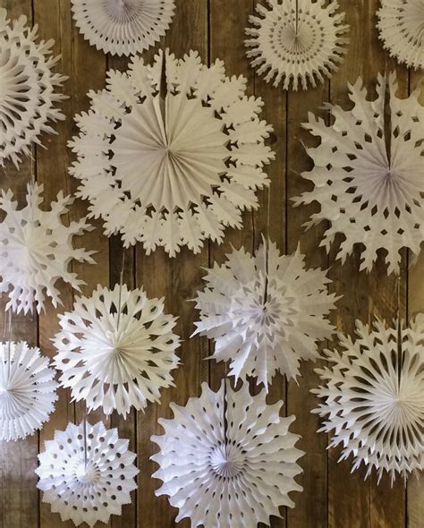 Maybe you would like to learn more about one of these? set of ten paper snowflake decorations by petra boase ltd | notonthehighstreet.com