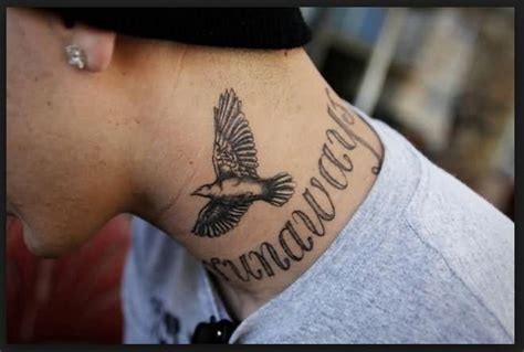 Black And Grey Flying Bird Tattoo On Man Side Neck Tattoosonneck