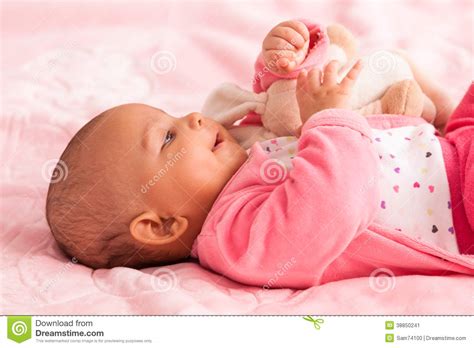African American Baby Girl Playing With A Plush Stock Image Image Of