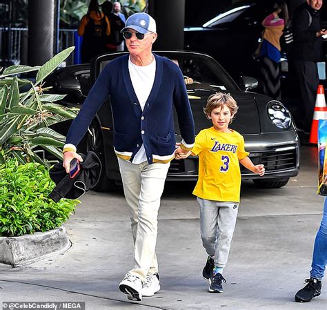 Michael Keaton Walks Hand In Hand With His Grandson River As They