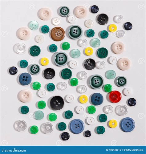 Colorful Mixed Sewing Buttons On White Background Flat Lay Stock Photo