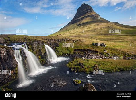 Mount Kirkjufell And Its Waterfalls Geothermal Zone Of The