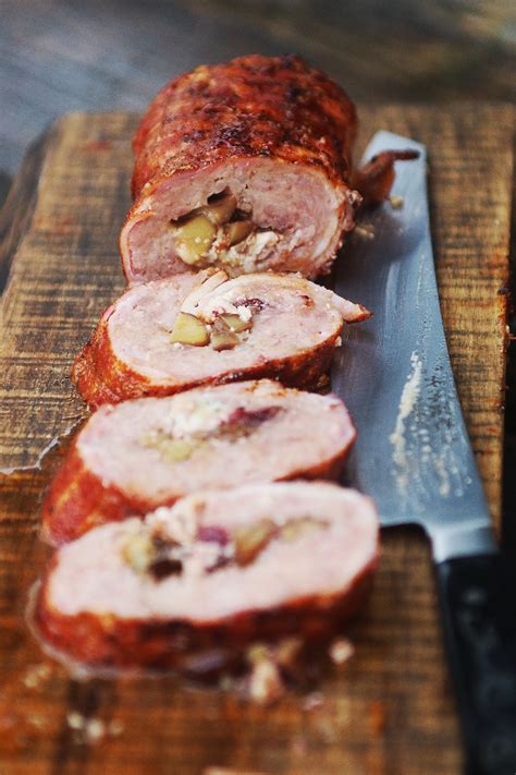 A fatty, wrapped in bacon, stuffed with feta cheese, olives and other goodies. A Christmas BBQ - The Festive Fatty - CountryWoodSmoke UK BBQ