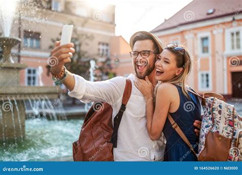 Happy Tourist Couple In Love Having Fun Travel Smiling On Vacation