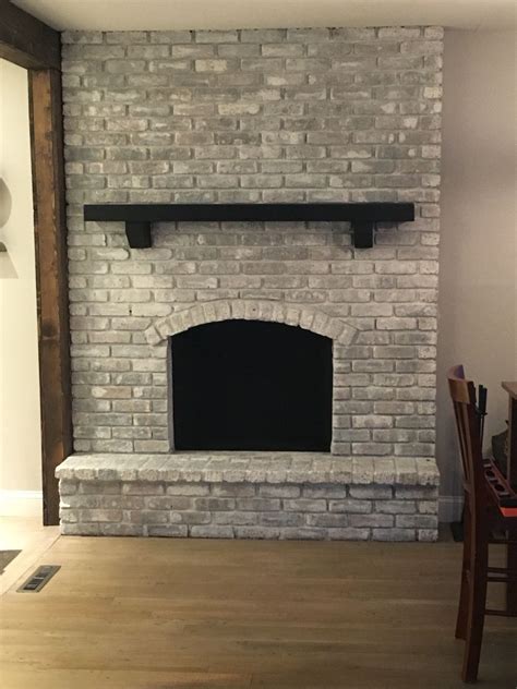 20 Black Brick Fireplace With White Mantel