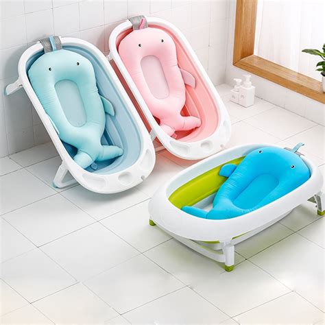 An inflatable bathtub lets you bathe baby on a counter or table. Baby bath tub support Newborn Baby bath cushion & chair ...