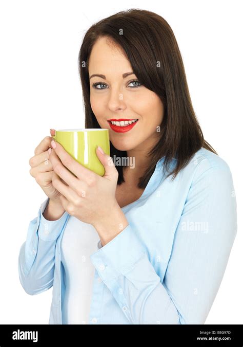 Attractive Young Woman Drinking Coffee Stock Photo Alamy