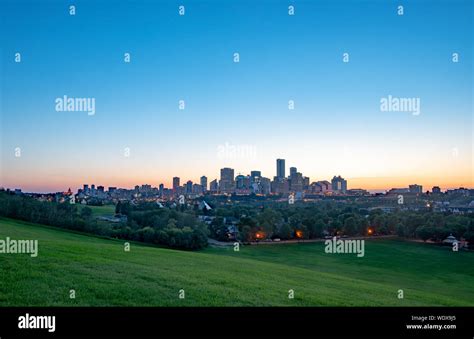 The City Of Edmonton Downtown Skyline During Dusk On A Summer Evening