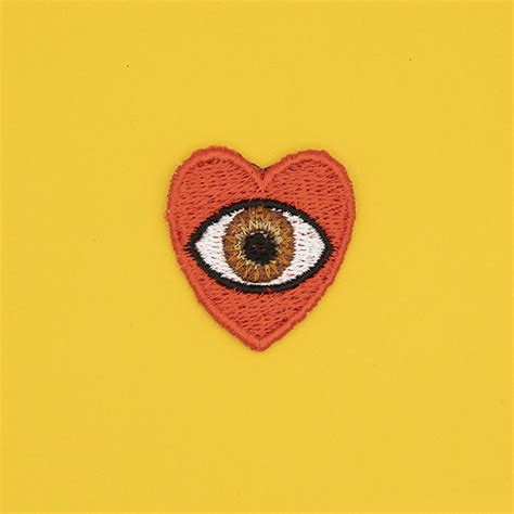 small heart and eye embroidered patch the unruly stitch