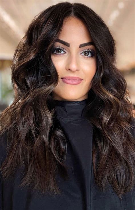 36 chic winter hair colour ideas and styles for 2021 dark chocolate wavy long hair