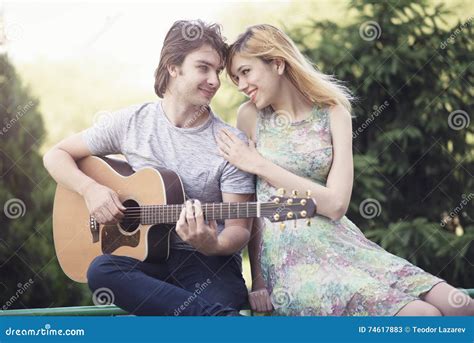 Young Couple In Love Enjoying A Sunny Day Stock Image Image Of Human Handsome 74617883