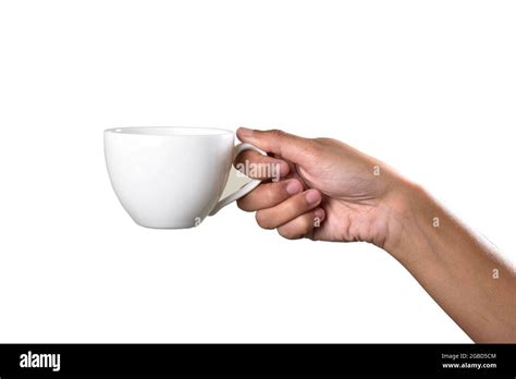 Hand Holding Tea Cup Isolated On White Background With Clipping Path