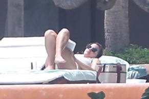 Emma Watson Wearing A Two Piece White Bikini While Enjoying Some