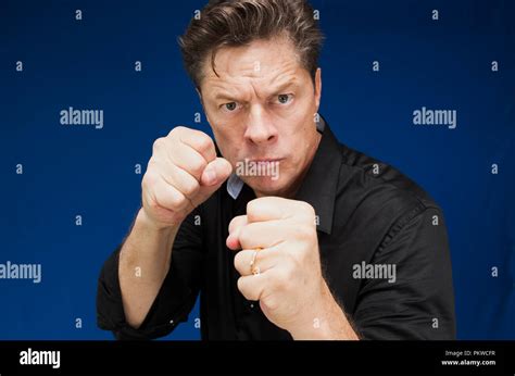 Aggressively Man Showing His Fist Stock Photo Alamy