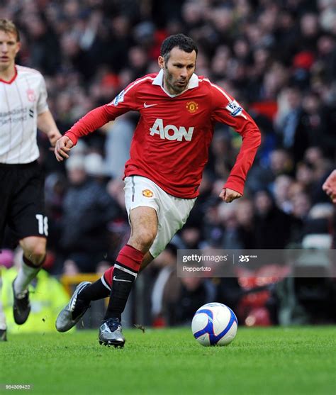 The reds are sitting at the top of the premier league table. Ryan Giggs of Manchester United in action during the FA ...