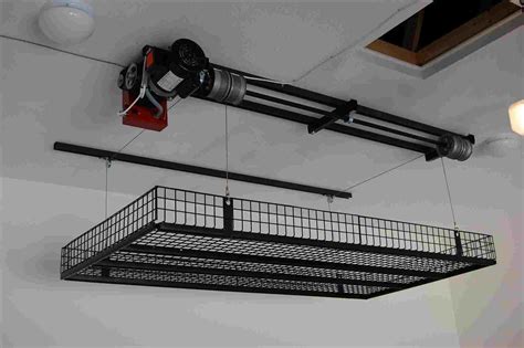 You want to get rid of old boxes or heavy items and put them in your attic. Garage Attic Lift System - Madison Art Center Design
