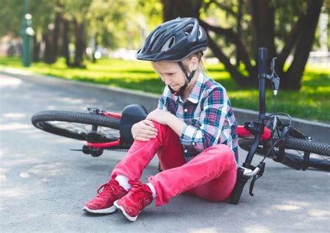 Bike Accident Of Little Girl Stock Photos Pictures And Royalty Free