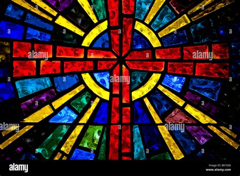 Cross Stained Glass Horizontal Window Above Altar In Christian Church