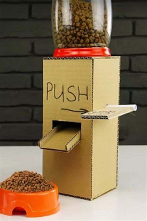 As puppy moves the tubber ware around treats fall out of. DIY Puppy Dog Food Dispenser from Cardboard at Home - Video | Diy dog food, Dog food recipes ...