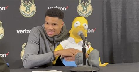 giannis is the first athlete to talk about birthday sex while holding a giant homer simpson