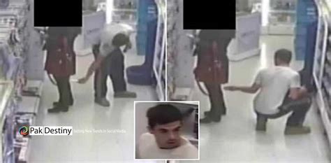 Pervert Caught On Camera Kneeling On The Ground And Using His Phone To Take Pictures Up A Woman