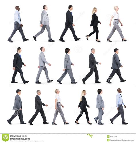 Group Of Business People Walking In One Direction Stock Photo Image