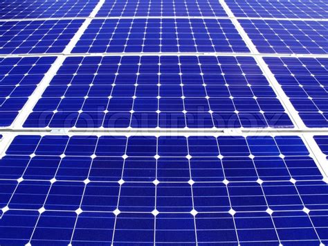 Solar cells are an application of photovoltaics and can be used to build photovoltaic systems. Background solar cell | Stock Photo | Colourbox