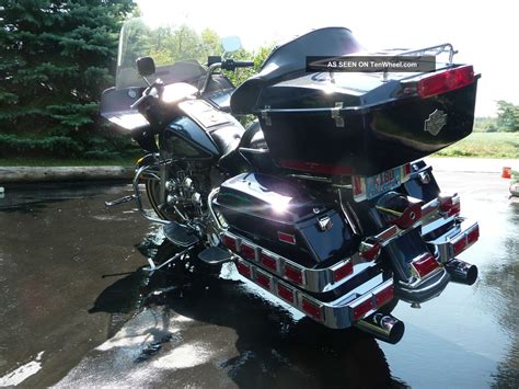 1998 harley super glide.� seeger cycle triple tree and fork extensions.� upgraded to 21 front wheel.� flat black with hand pin striping.� beautiful paint job.� seeger headlight.� new tires and drive belt at 12,500 miles.�. 1985 Harley - Davidson Flt Tour Glide