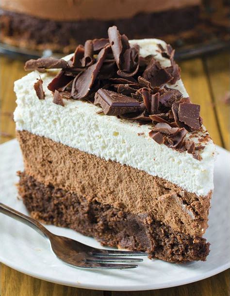 This is a chocolate lovers dream and a perfect treat to make for any celebration! Triple Chocolate Mousse Cake | TheBestDessertRecipes.com