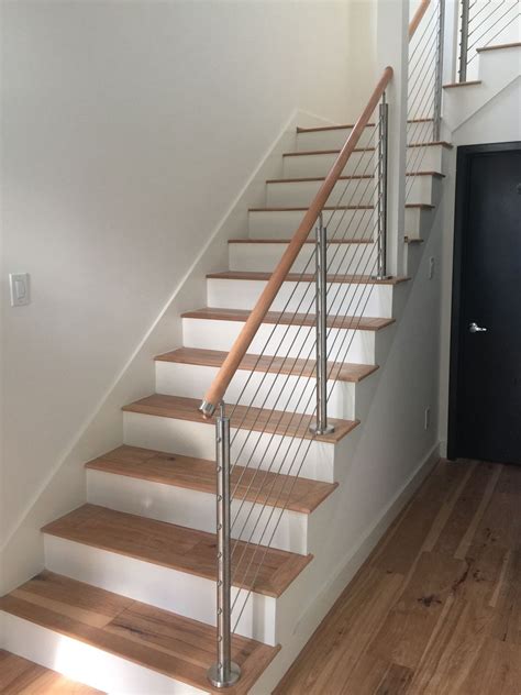 Auburn + dayton project reveal, horizontal railing design, horizontal railingbasement, black railing, black staircase railing, horizontal railing, black railing banister, horizontal railing stairs basement. Our #StainlessSteel #wire rope #railing with #wood #rail ...