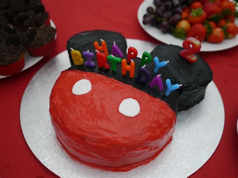 Mickey mouse cake & cupcakes for two year old (see mickey's fingers). Mickey Mouse birthday cake.