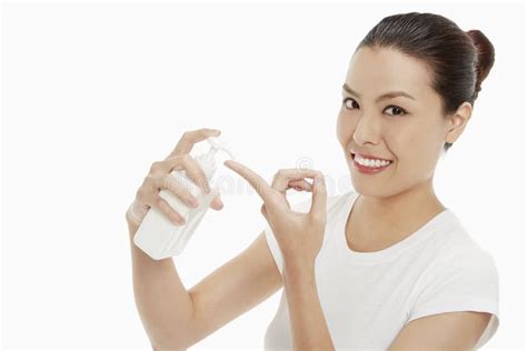 Woman Squirting Lotion Onto Her Finger Stock Image Image Of Lotion
