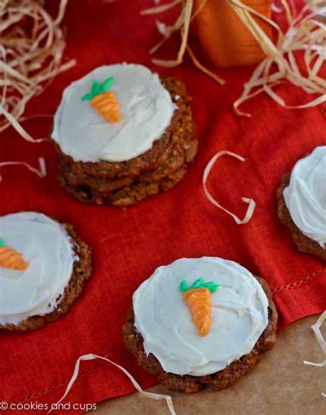 Carrot cake cookies studded with white chocolate chips and smothered in a coconut cream cheese frosting! Cake Mix Carrot Cake Cookies with Homemade Cream Cheese Frosting