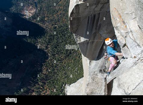 High Angle View Of Mountaineer Climbing Up Sheer Wall Of The Nose El Capitan Yosemite National