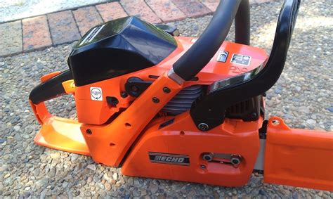 Oregon 563474 chainsaw safety protective helmet with visor combo set. ECHO CS-6702 CHAINSAW - 66.7CC ENGINE - USED ONCE - JARROD'S POWER EQUIPMENT