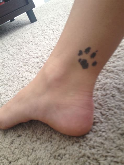 Name and paw prints tattoo name with paw prints showing progressive. Pin by Jenny Bean on Body Art | Cat paw print tattoo, Cat ...