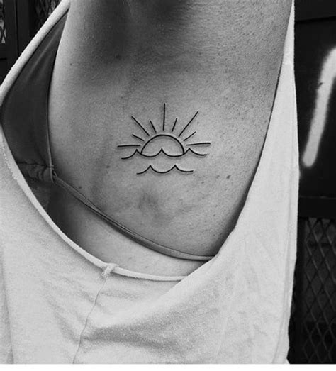 Sun Tattoo On Rib Tattoos Sun Tattoo Symbolic Tattoos