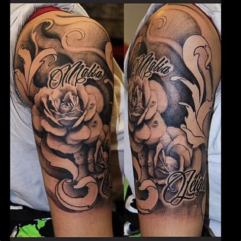 Black rose flowers and clock sleeve tattoo Black And White Rose Flowers Half Sleeve Tattoo | Sleeve ...