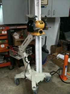 This bench grinder stand fits perfectly to my bench grinder. Homemade Grinder Stand - HomemadeTools.net