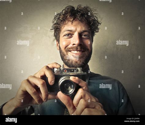 Man Holding Vintage Camera Stock Photo Alamy