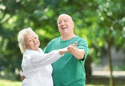 Cute Elderly Couple Dancing Outdoors Picture Image 127304841