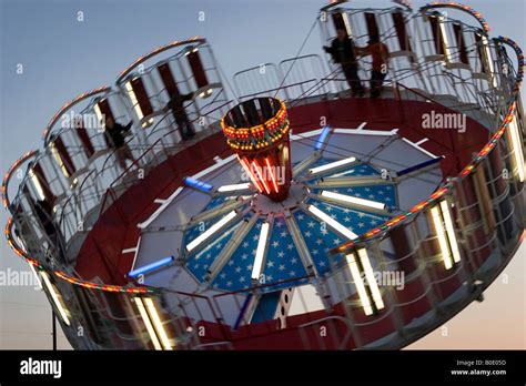 Spinning Round Up Amusement Ride At Night Stock Photo Alamy