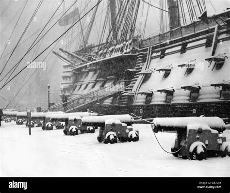 Admiral Nelsons Flagship Hms Victory Covered In Snow At Its Berth In