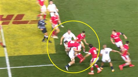 Social media erupts following England try after tackle in the air is