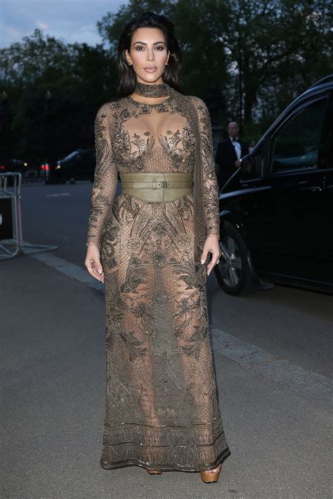 Kim Kardashian Goes Sheer In Lace Dress For Vogue 100