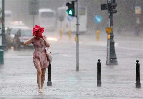 Ordinary Day Walking In The Rain Weather Report Downpour